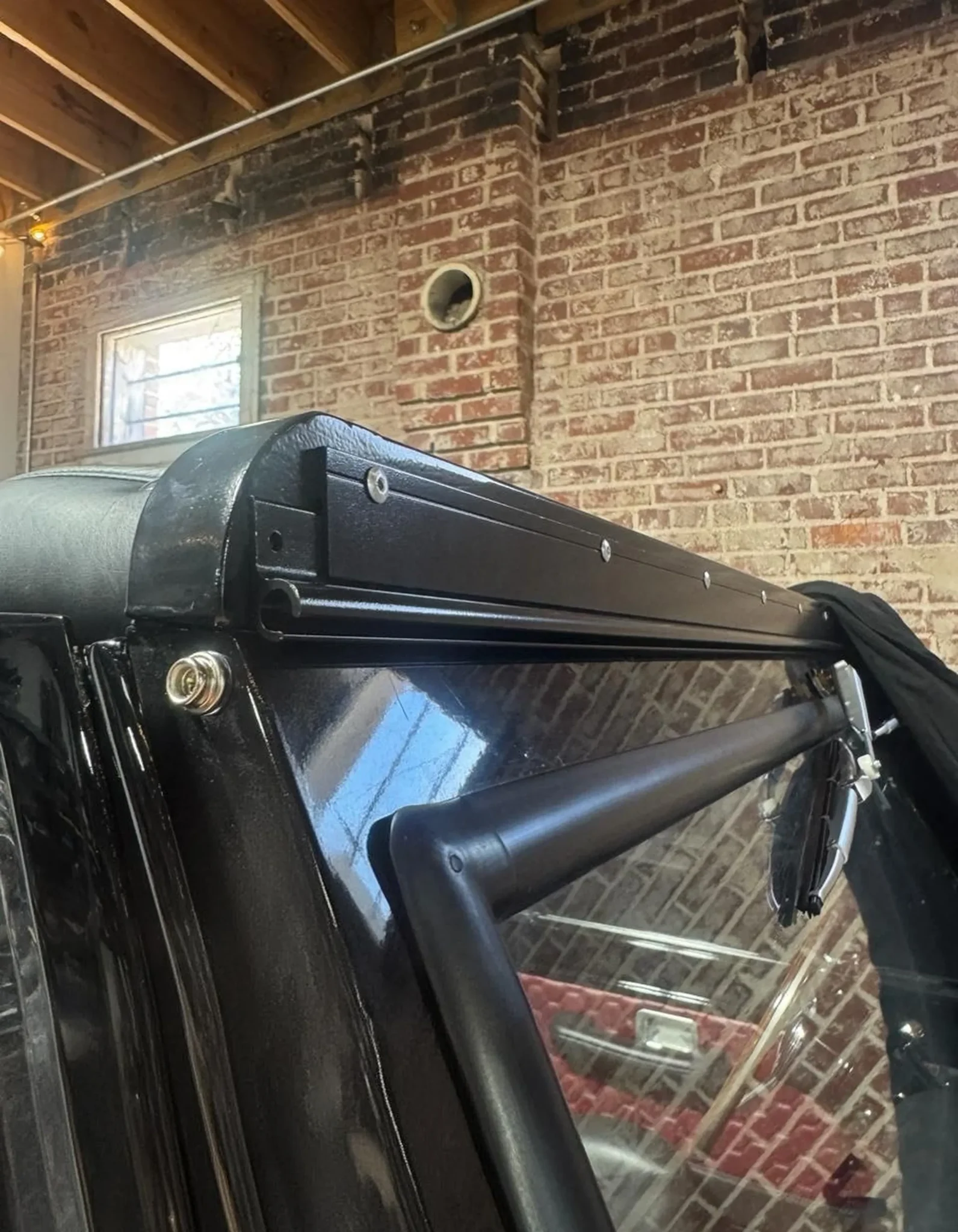 Windshield Riser Bar